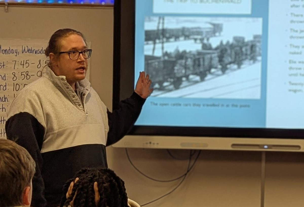A photo of Mr. Fobar teaching in front of his class