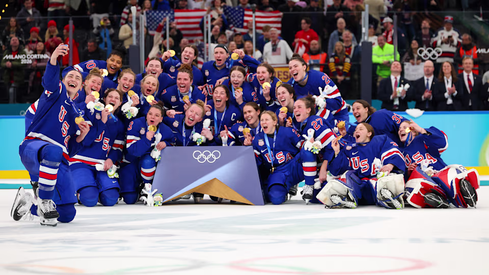 The United States Olympic women's hockey team celebrates their tight win against Canada at the 2026 Milan Winter Olympics.